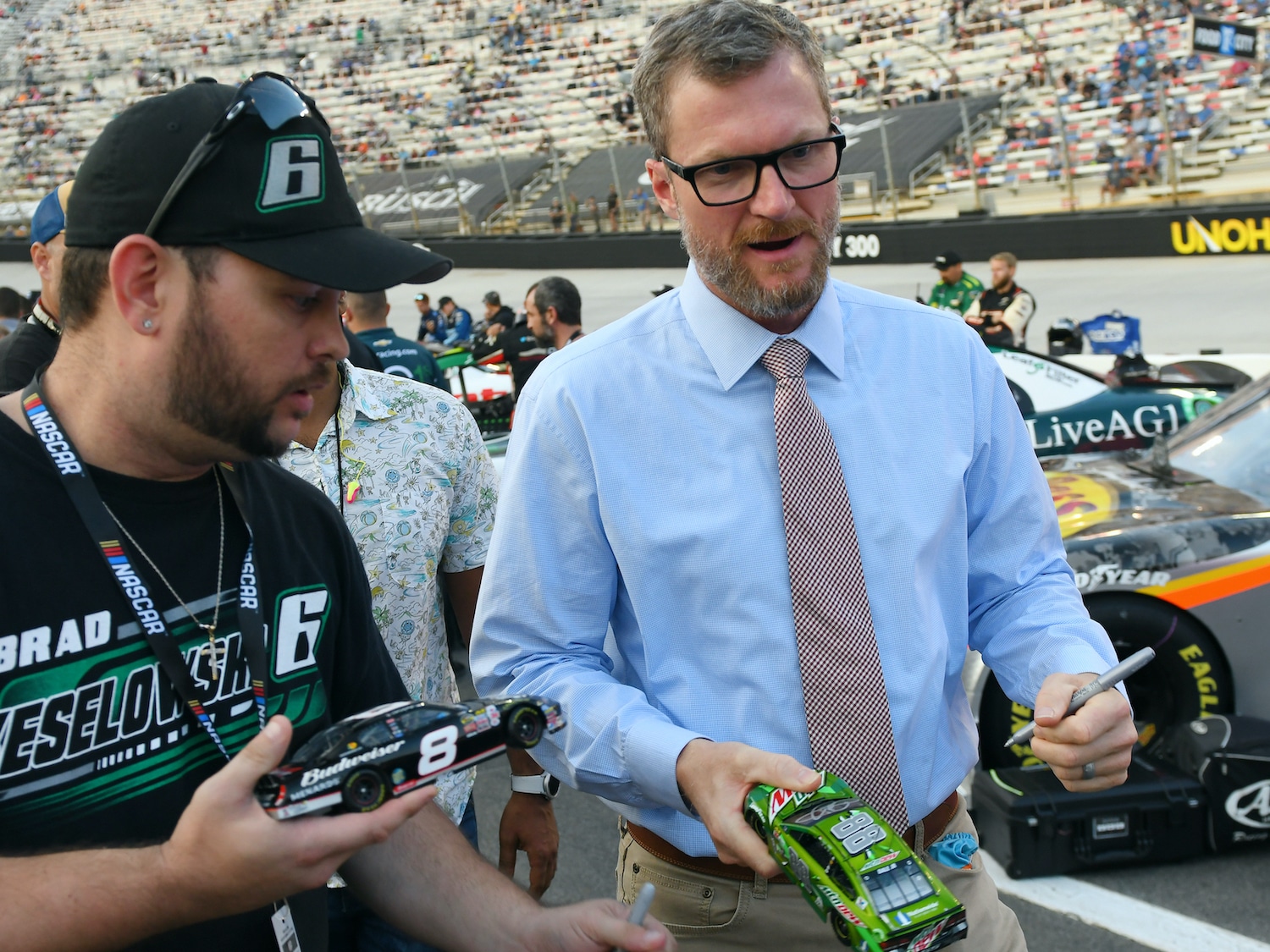 Dale Earnhardt Jr. signs autograph