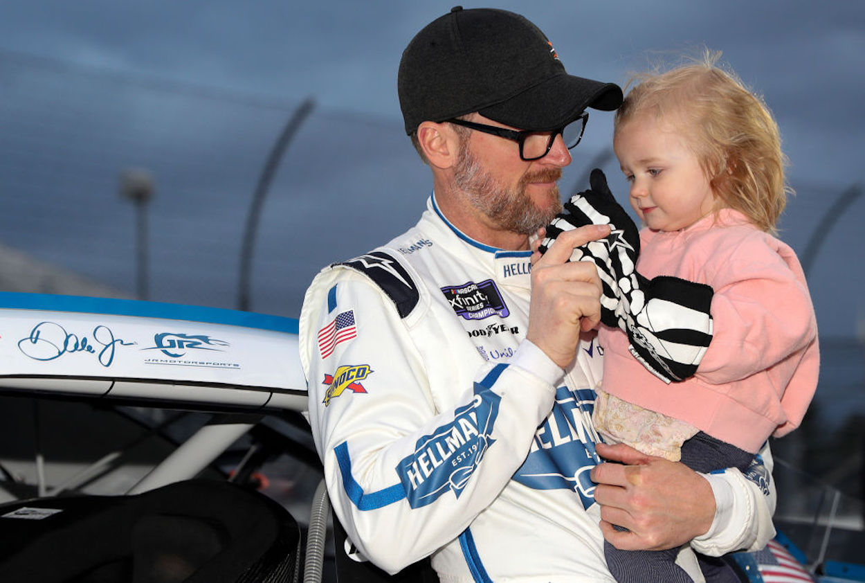 Dale Earnhardt Jr. holds his daughter Nicole ahead of the NASCAR Xfinity Series Call 811 Before You Dig 250