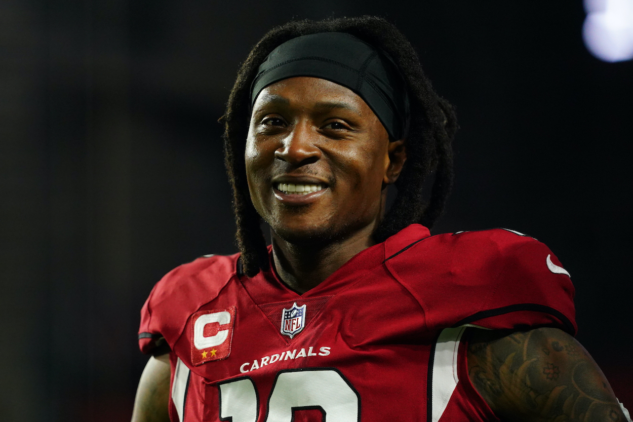 DeAndre Hopkins smiles before a game against the Rams.