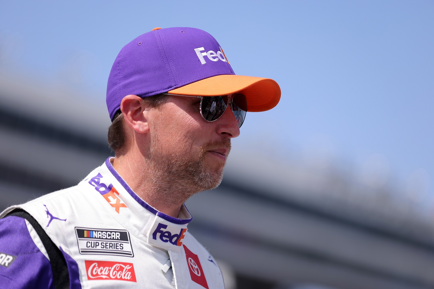 Denny Hamlin stands on the grid prior to the NASCAR Cup Series Auto Trader EchoPark Automotive 500 at Texas Motor Speedway on Sept. 25, 2022, in Fort Worth, Texas.