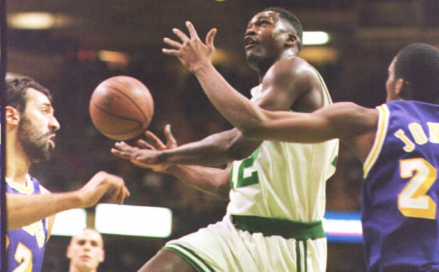 Dominique Wilkins of the Boston Celtics drives to the basket.