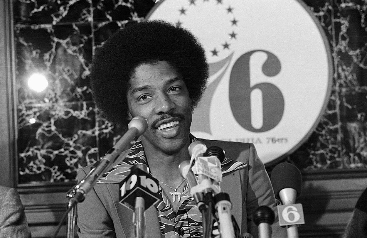 Julius Erving, also known as Dr. J, meets with the media after joining the Philadelphia 76ers.