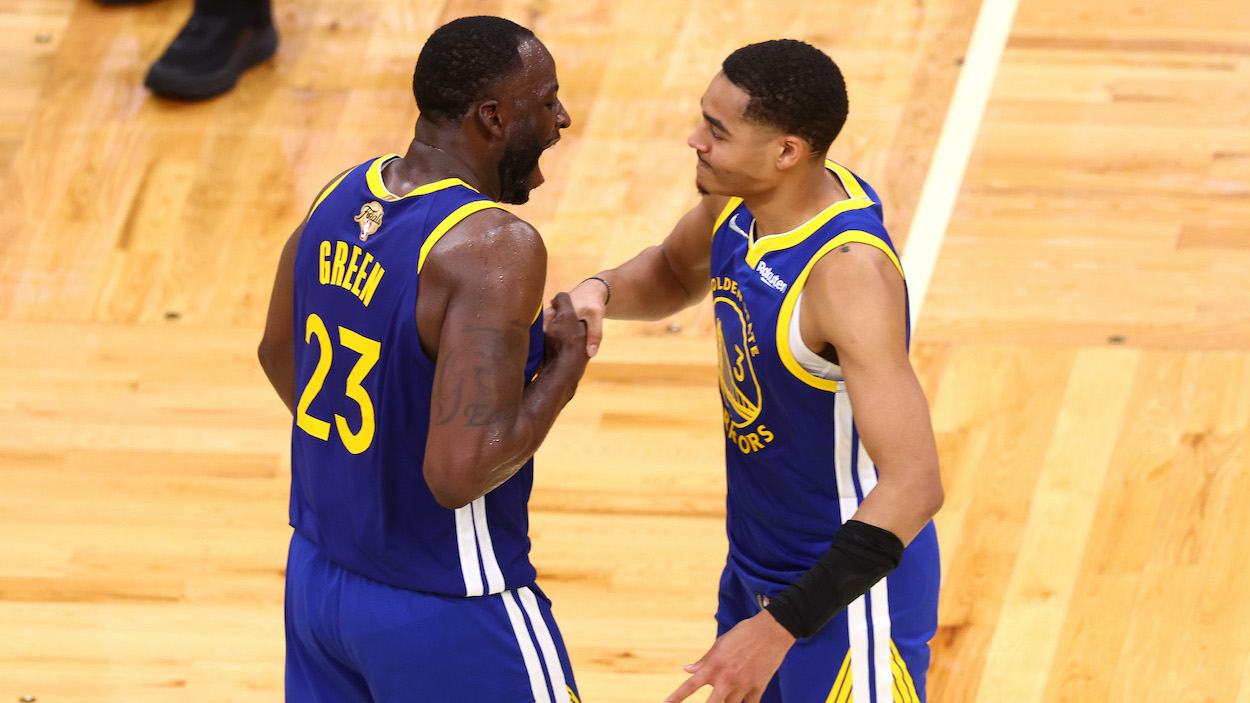 Jordan Poole and Draymond Green of the Golden State Warriors.