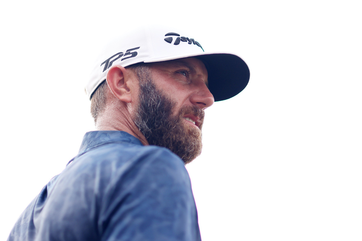 Dustin Johnson looks on during an LIV Golf event.