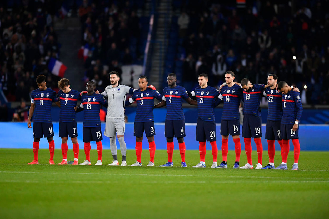 The French national team stands together ahead of a World Cup qualifying match.