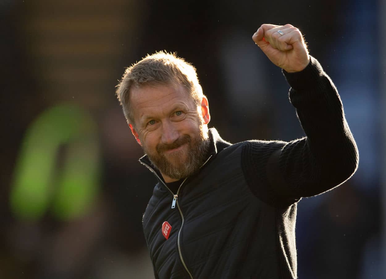 Graham Potter gestures to the crowd after a Chelsea match.