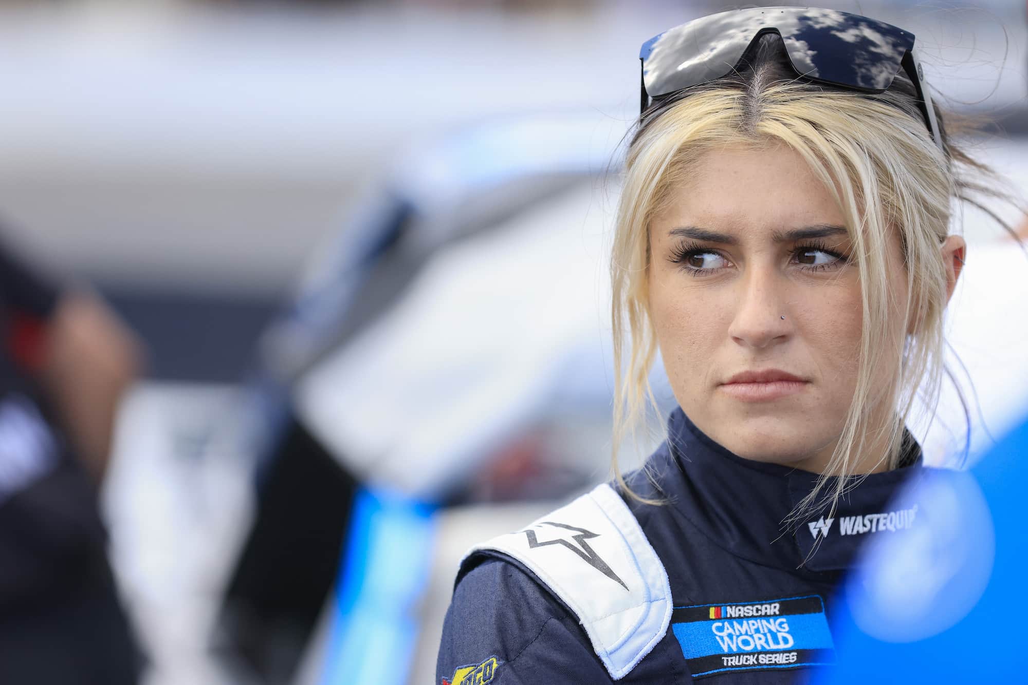 Hailie Deegan waits on grid