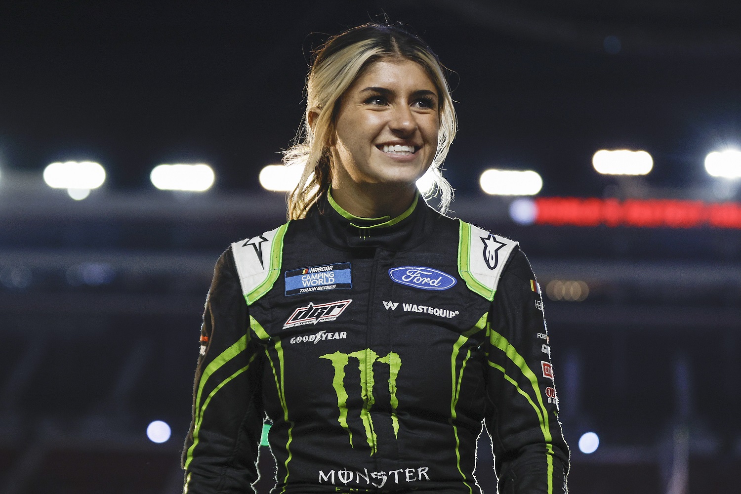 Hailie Deegan walks onstage during driver intros prior to the NASCAR Camping World Truck Series UNOH 200 at Bristol Motor Speedway on Sept. 15, 2022 in Bristol, Tennessee.