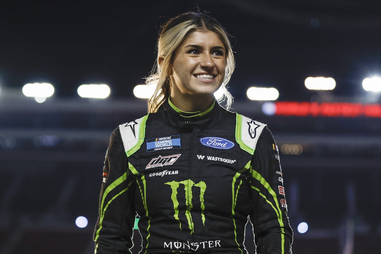 Hailie Deegan walks onstage during driver intros prior to the NASCAR Camping World Truck Series UNOH 200 at Bristol Motor Speedway on Sept. 15, 2022 in Bristol, Tennessee. | Sean Gardner/Getty Images