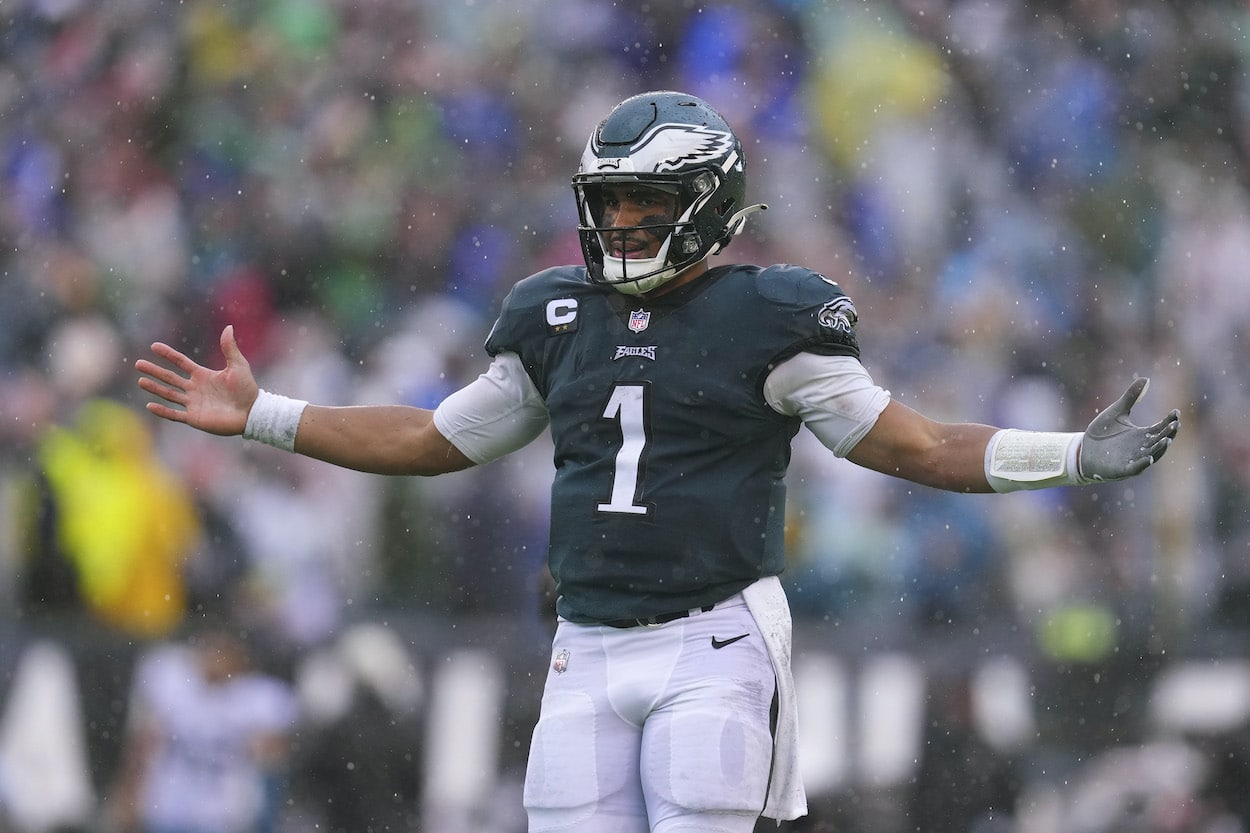 Jalen Hurts looks for a flag against the Jaguars.