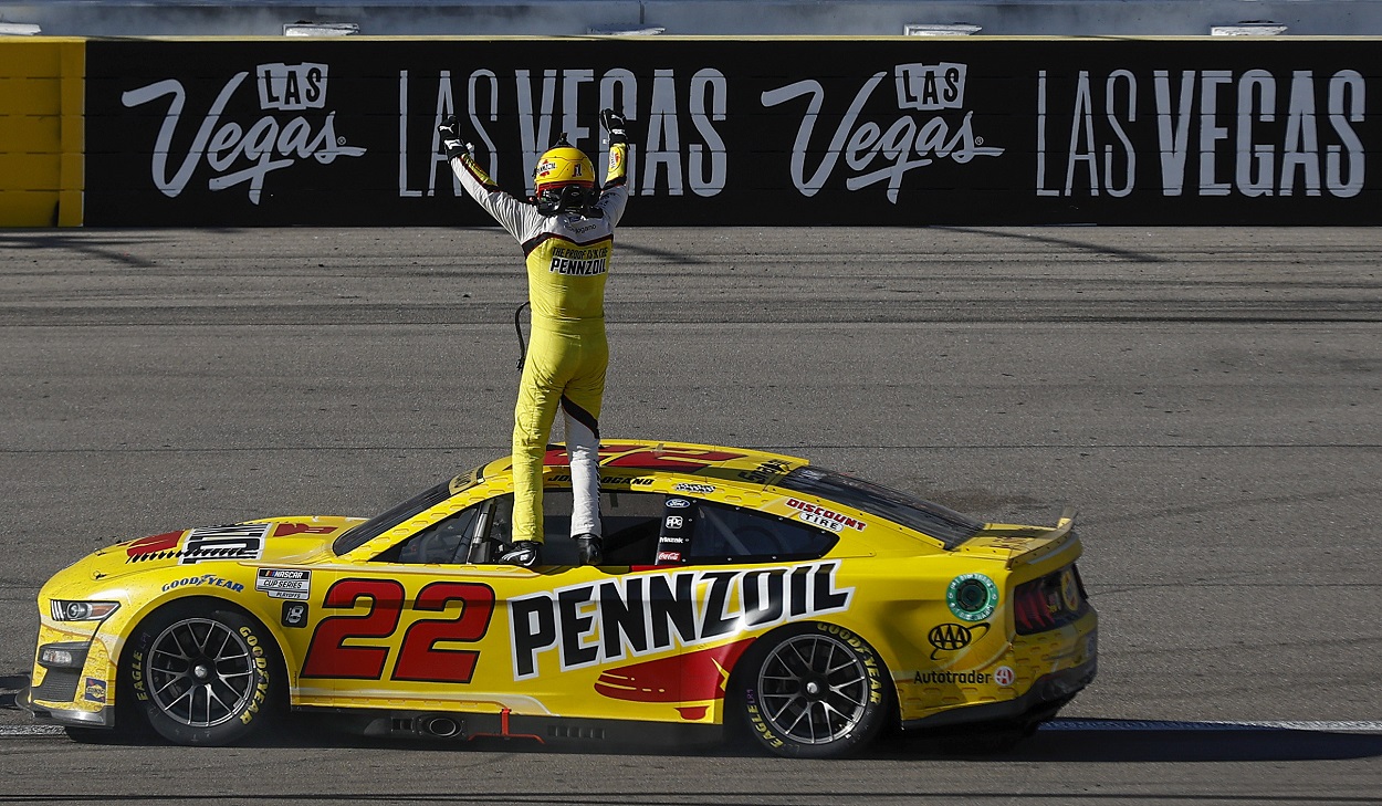 Joey Logano celebrates after winning the 2022 NASCAR Cup Series South Point 400