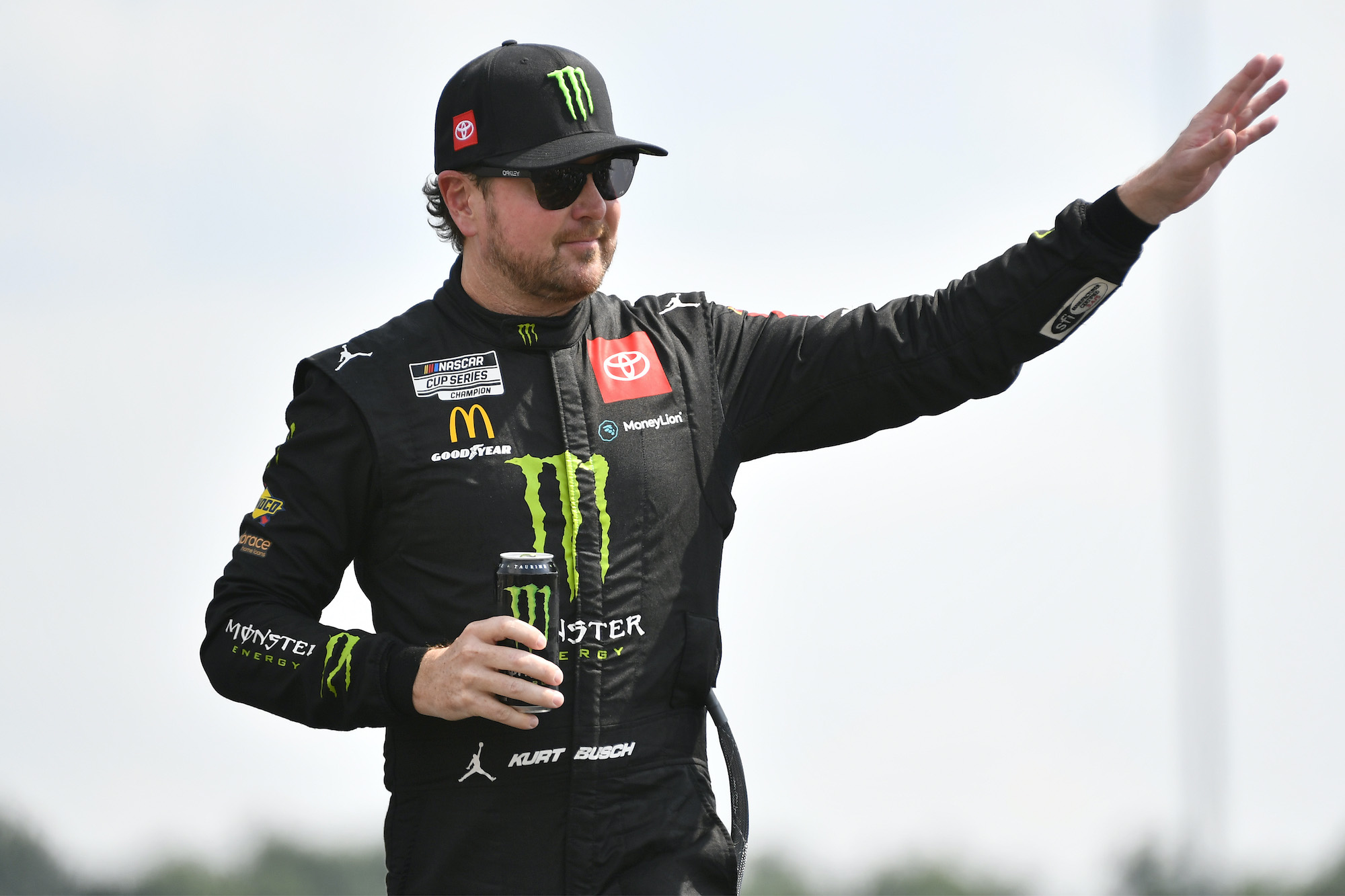 Kurt Busch waves to fans onstage during driver intros prior to the NASCAR Cup Series Ally 400 at Nashville Superspeedway on June 26, 2022. | Photo by Logan Riely/Getty Images