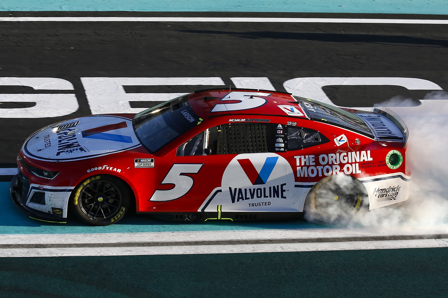 Kyle Larson celebrates with a burnout after winning the NASCAR Cup Series Dixie Vodka 400 at Homestead-Miami Speedway on Oct. 23, 2022.