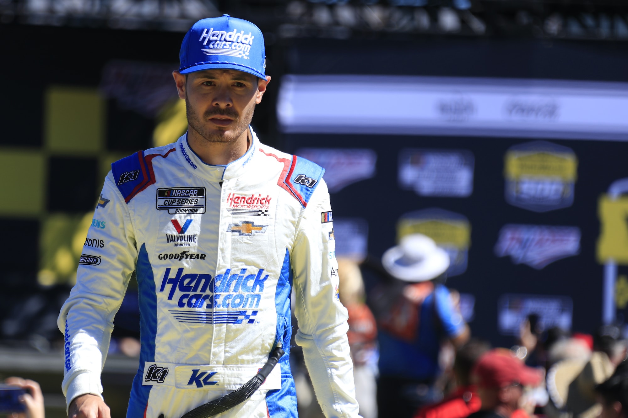 Kyle Larson walks on pit road