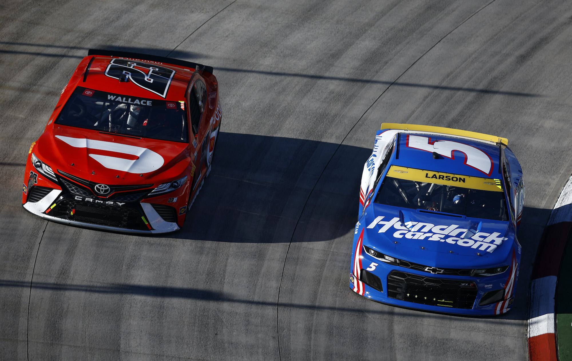 Kyle Larson and Bubba Wallace race