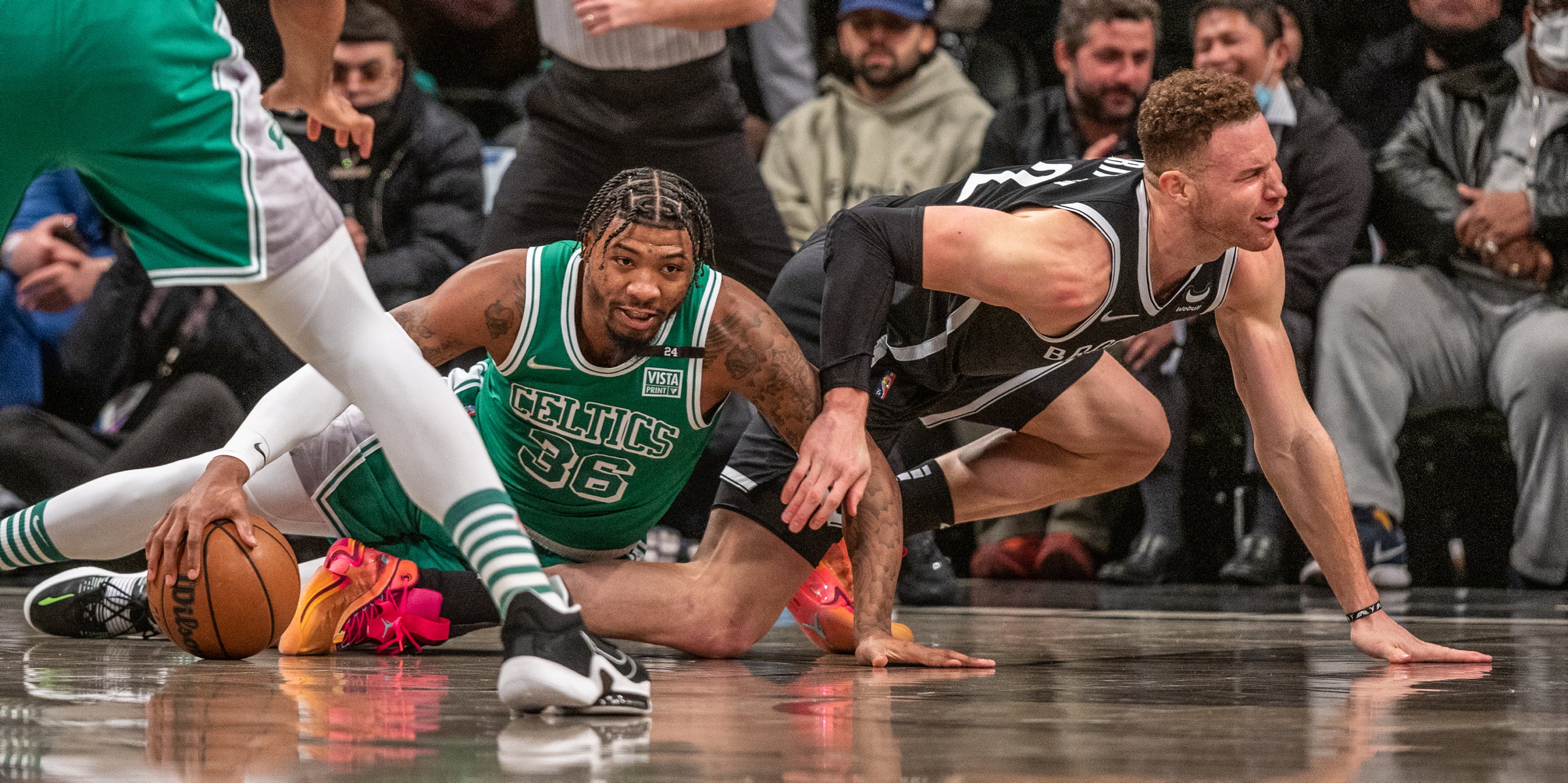 Brooklyn Nets' Blake Griffin loses the ball to Marcus Smart of the Boston Celtics.