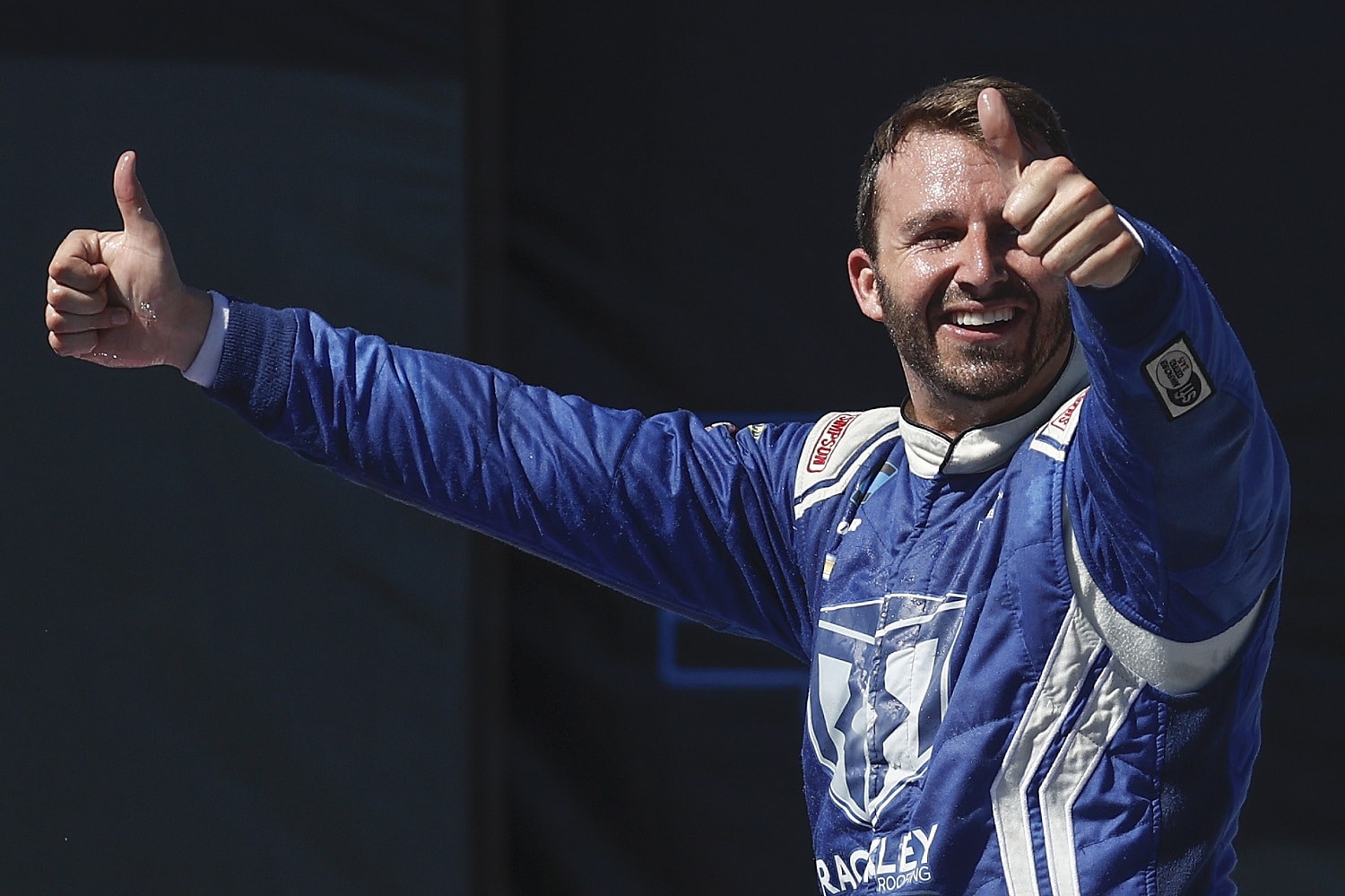 Matt DiBenedetto celebrates in Victory Lane after the NASCAR Camping World Truck Series Chevy Silverado 250 at Talladega Superspeedway on Oct. 1, 2022.