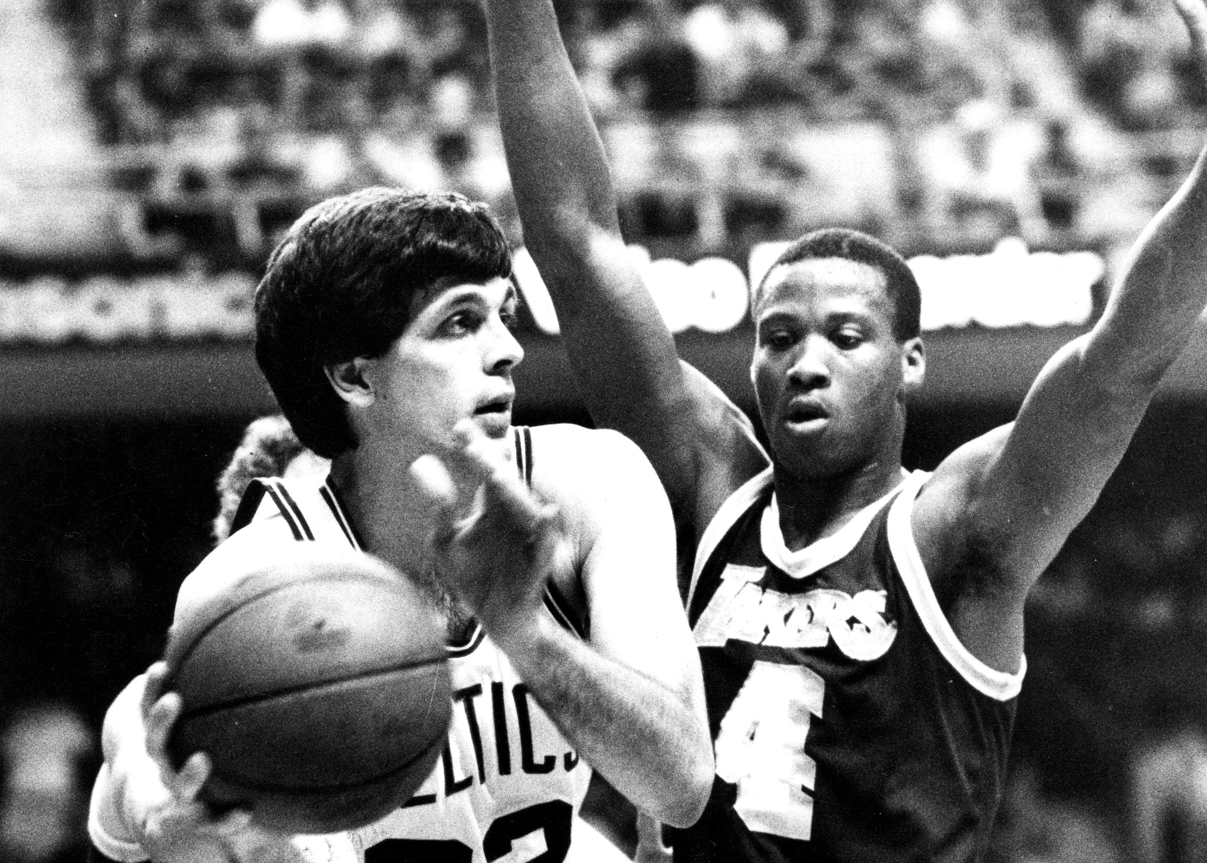 Boston Celtics' Kevin McHale is guarded by the Lakers' Byron Scott during Game 7 of the 1984 NBA Finals.
