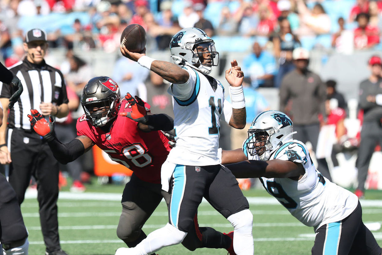 Carolina Panthers quarterback PJ Walker throws a pass.