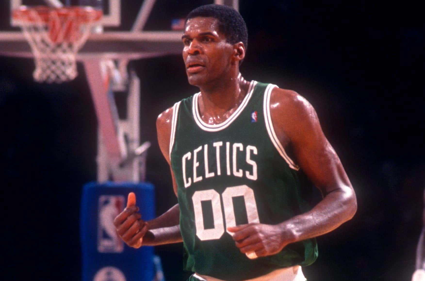 Robert Parish of the Boston Celtics runs up the court.