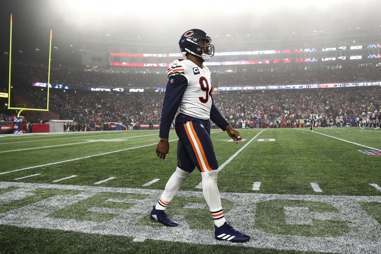 Robert Quinn looks on during a game against the Patriots.