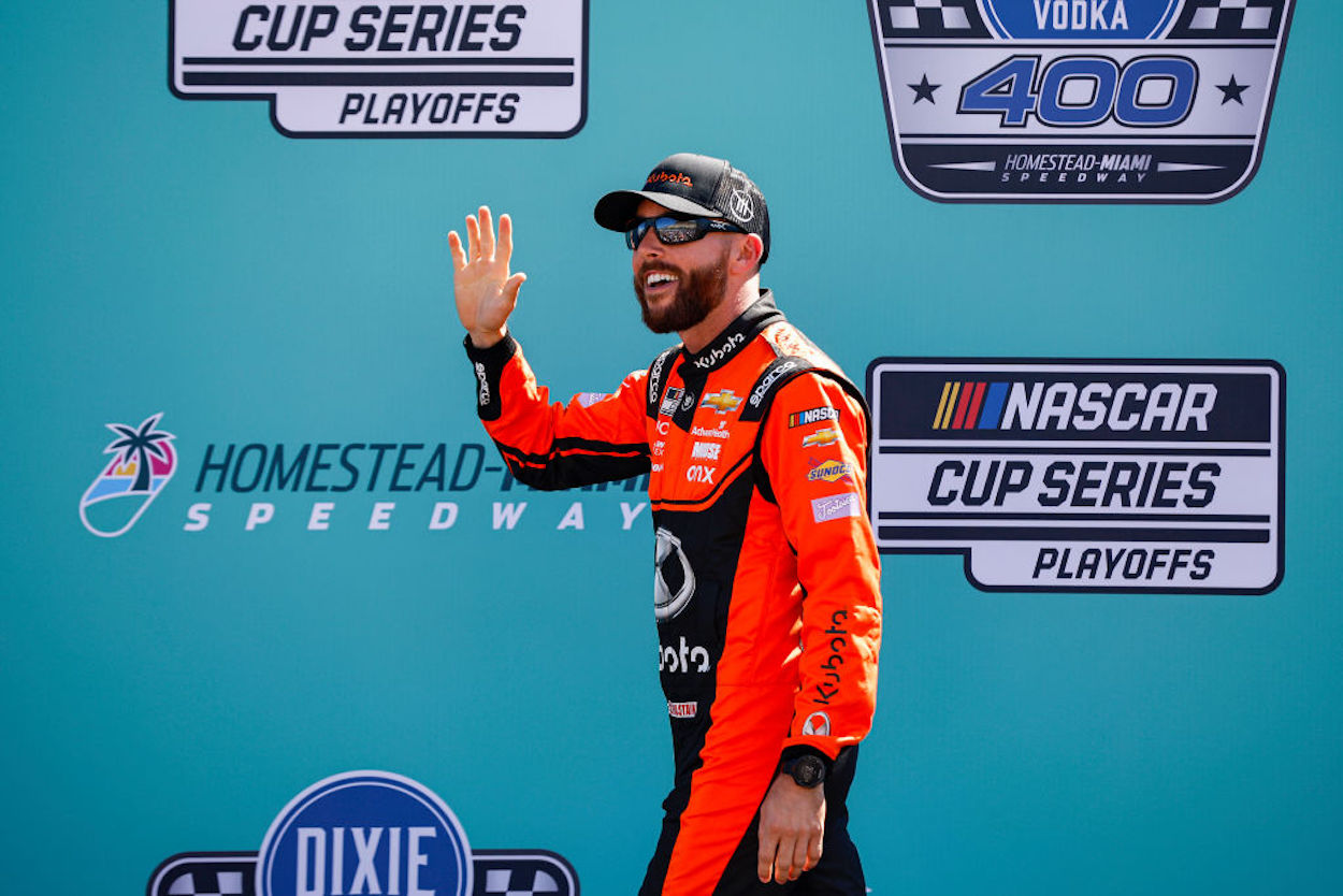 Ross Chastain waves to fans during driver intros for driver intros ahead of the NASCAR Cup Series Dixie Vodka 400.