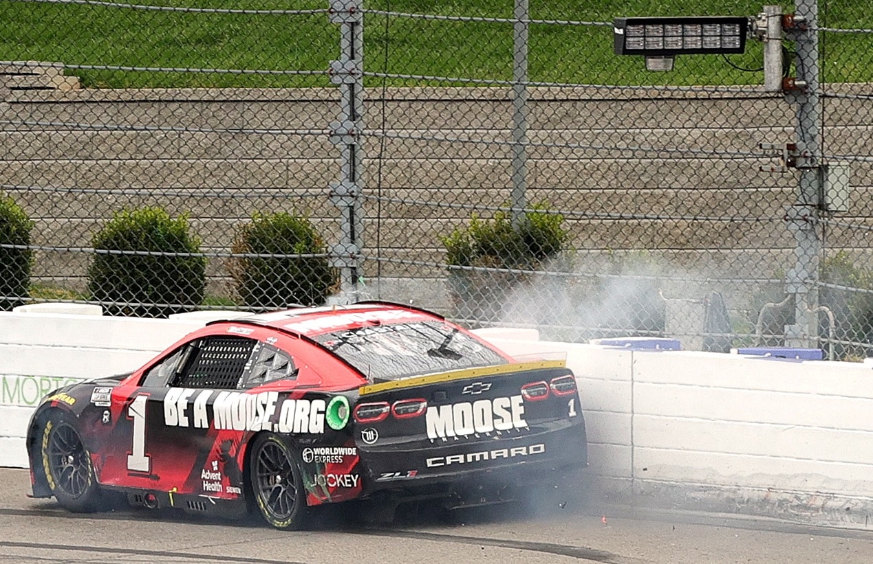 Ross Chastain rides the wall on the final lap of the NASCAR Cup Series Xfinity 500 at Martinsville Speedway on Oct. 30, 2022. | Stacy Revere/Getty Images