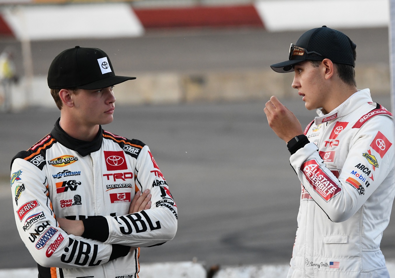 Jesse Love, left, talks with Sammy Smith during driver introductions for the ARCA Menards Series Menards 250 on June 25, 2022, at Elko Speedway in Elko New Market, Minnesota. | Josh Holmberg/Icon Sportswire via Getty Images
