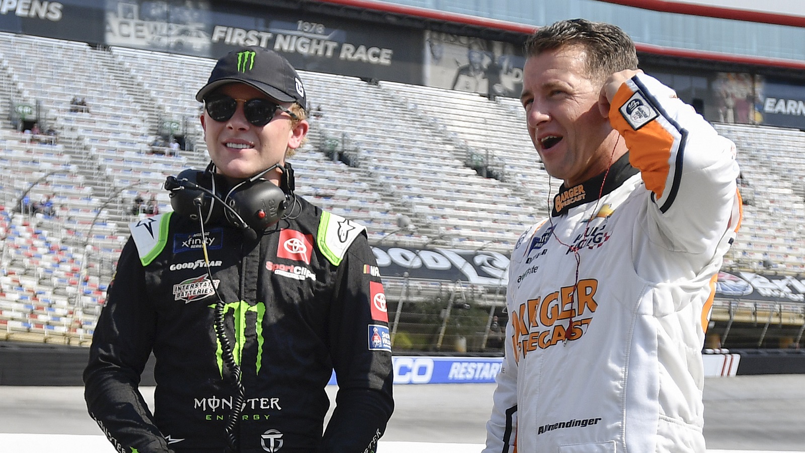 Ty Gibbs and AJ Allmendinger talk on the grid during qualifying for the NASCAR Xfinity Series Food City 300 at Bristol Motor Speedway on Sept. 16, 2022, in Bristol, Tennessee.