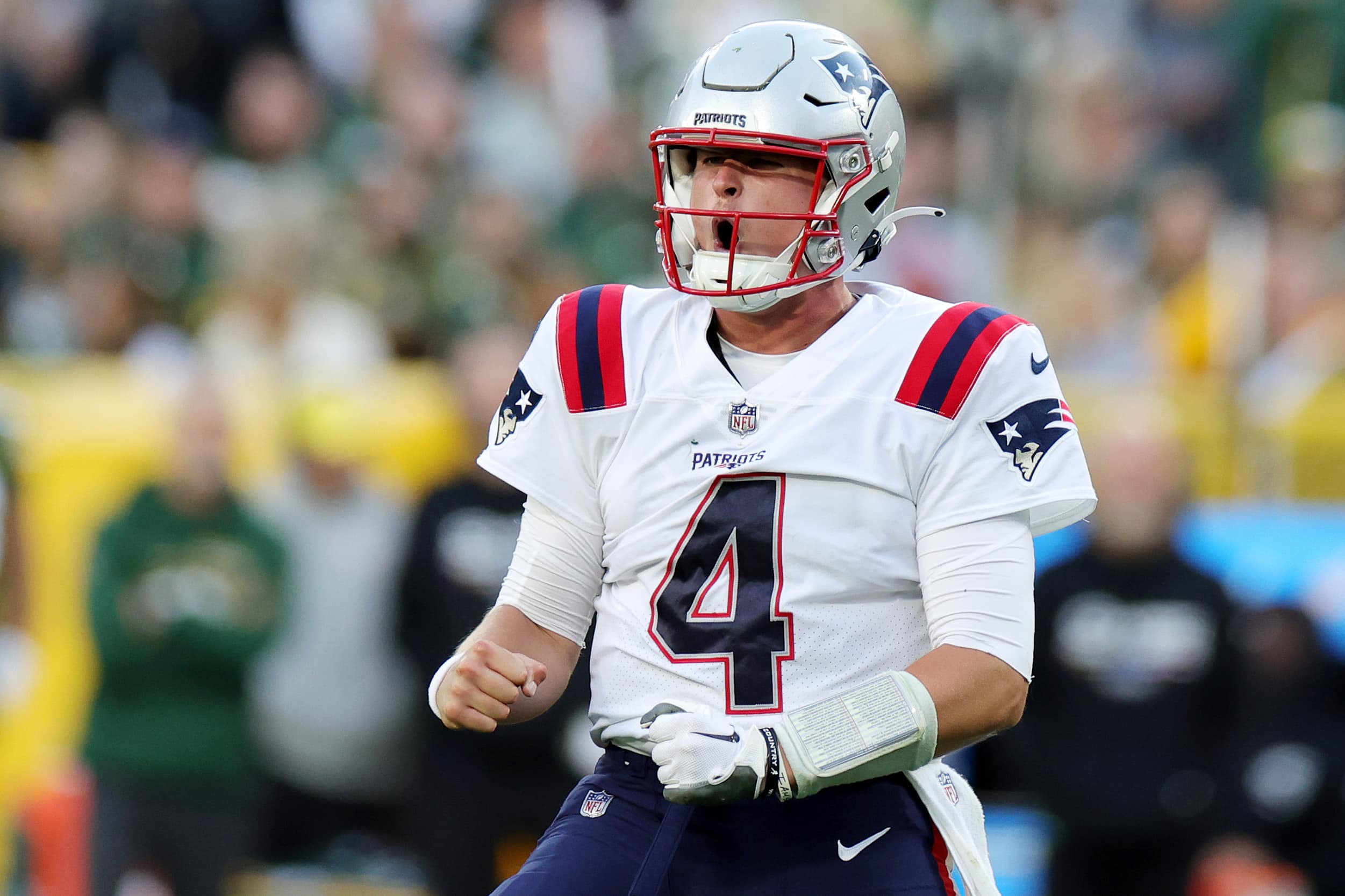 Bailey Zappe of the New England Patriots celebrates a touchdown.