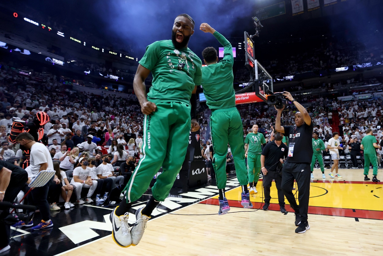 Jaylen Brown and Jayson Tatum of the Boston Celtics jump in the air prior to Game 1 against the Miami Heat.