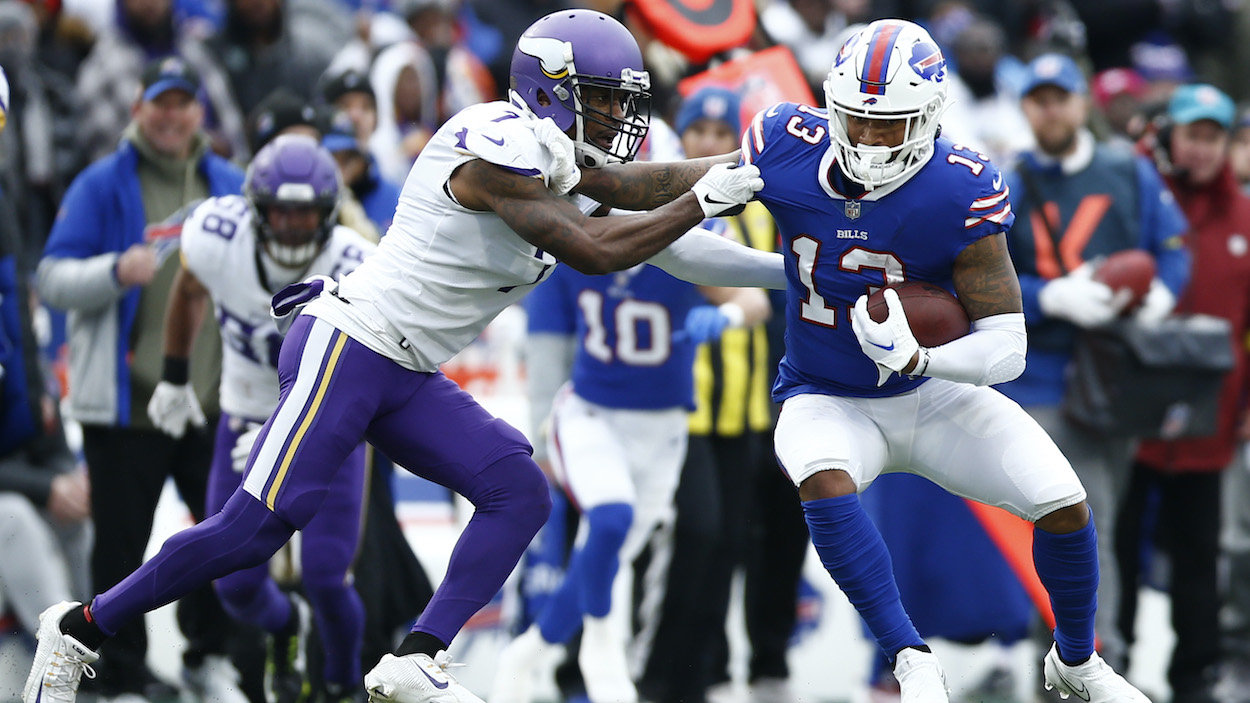 Patrick Peterson of the Minnesota Vikings tackles Gabe Davis of the Buffalo Bills. The NFL referee boss admitted officials missed a call on Davis late in the Bills-Vikings game.