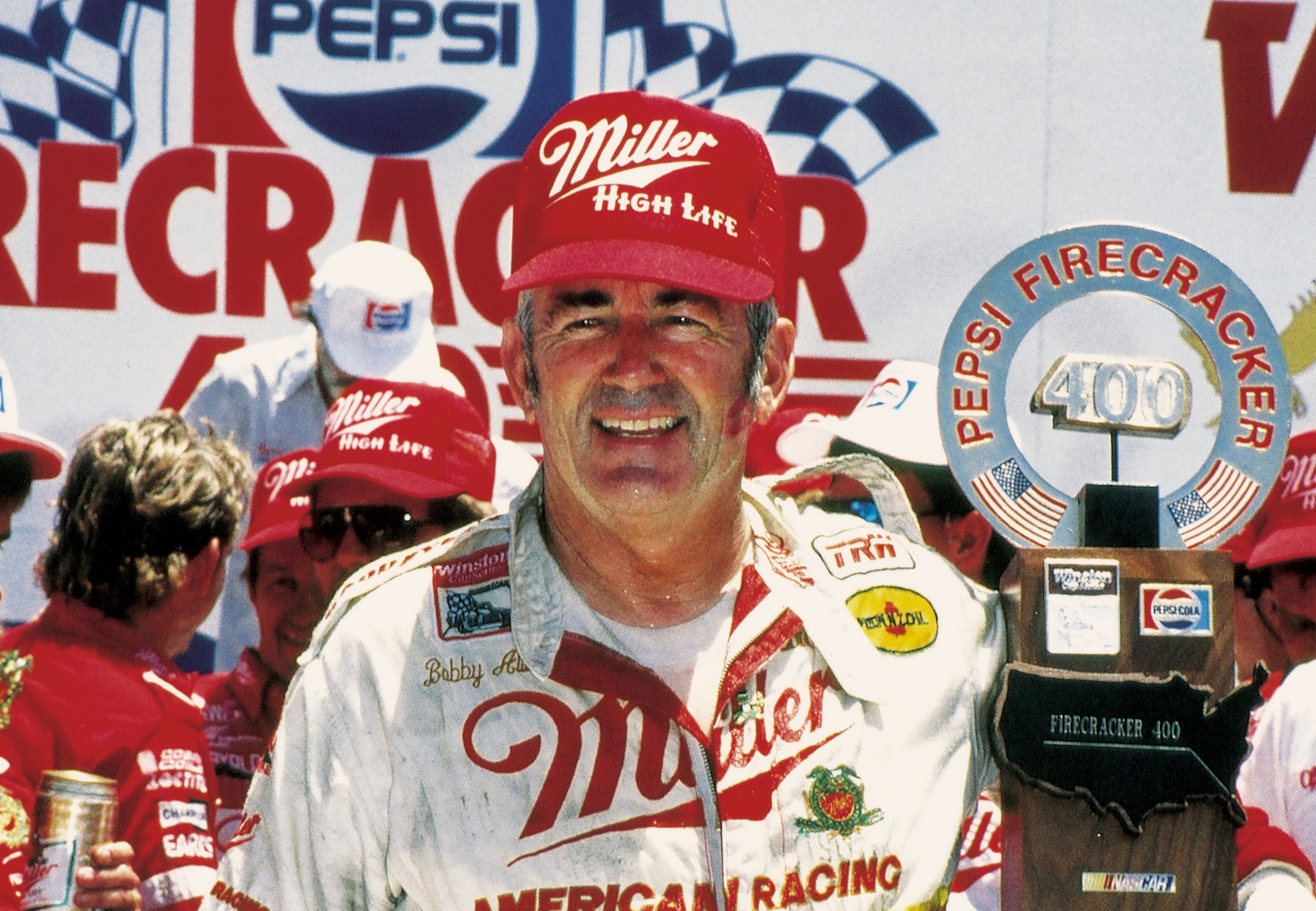Bobby Allison poses by his car at Daytona Beach, Florida, on July 4, 1987. He took the lead with two laps remaining to win the 1987 Pepsi 400 at Daytona in the Stavola Bros. Buick.