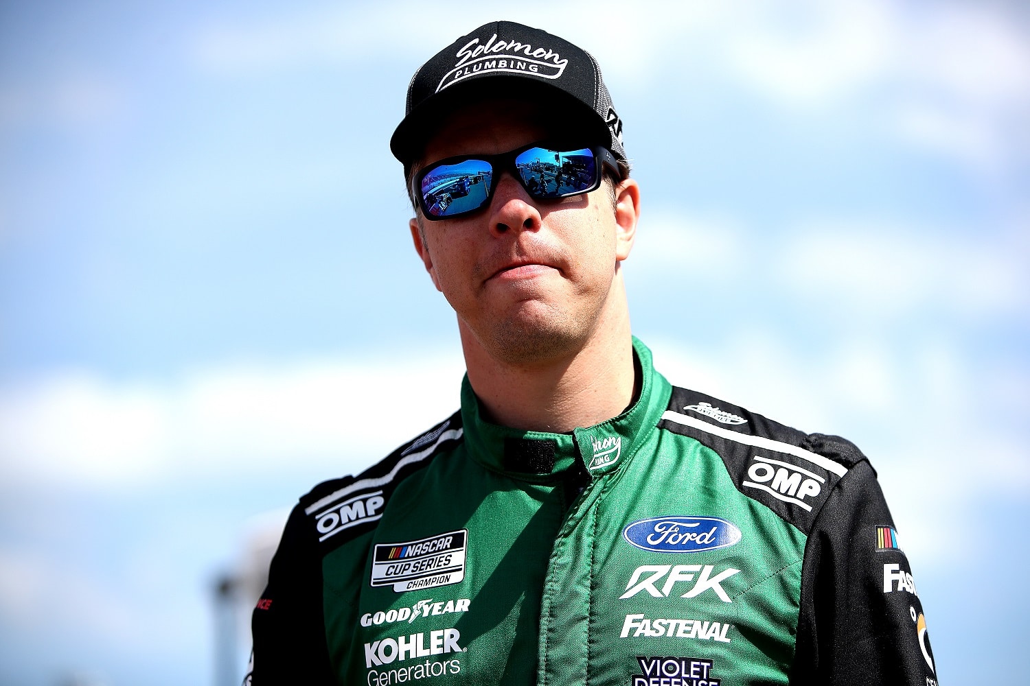 Brad Keselowski walks the grid during qualifying for the NASCAR Cup Series Enjoy Illinois 300 at WWT Raceway on June 4, 2022.