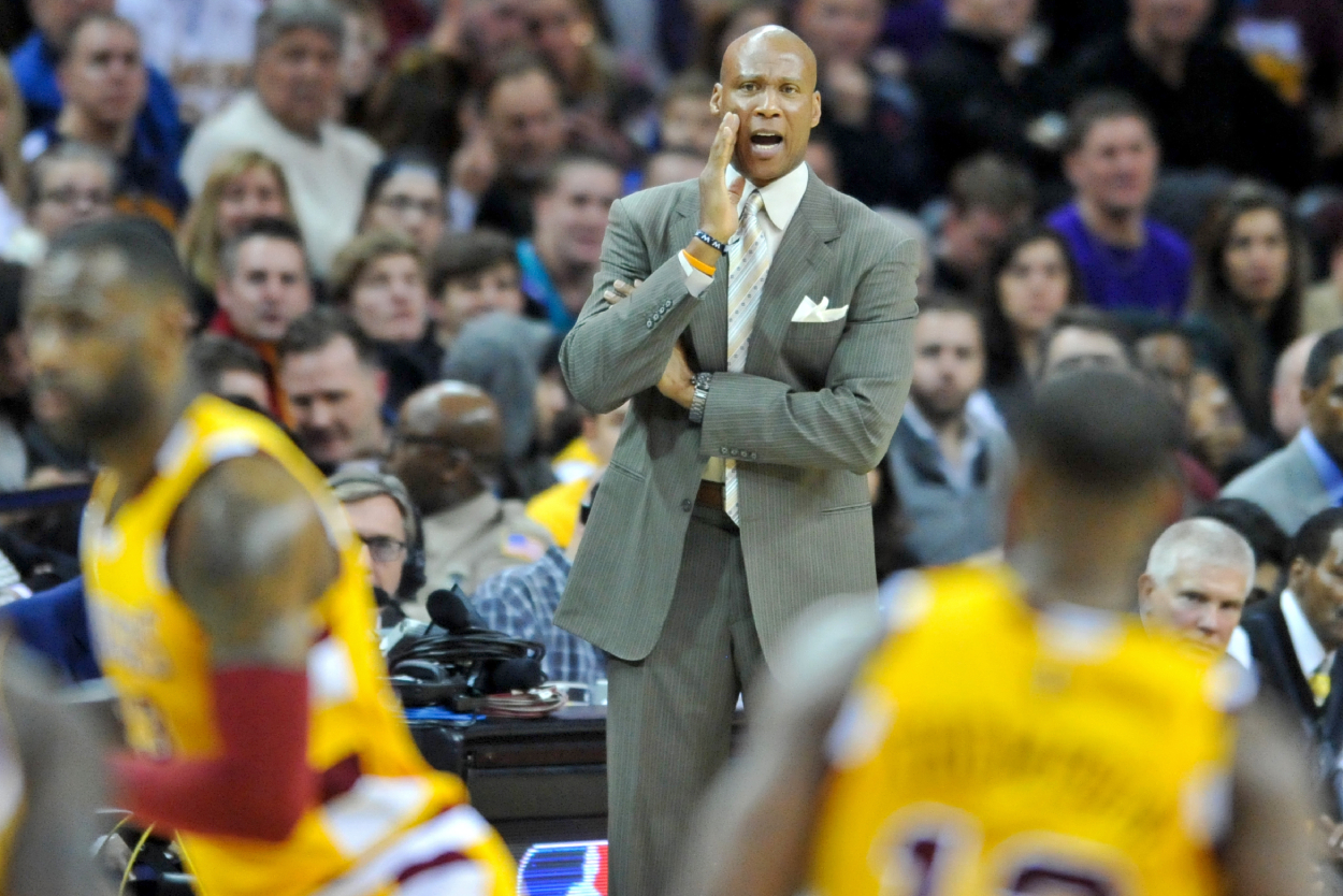 Head coach Byron Scott of the Los Angeles Lakers yells toward his team.