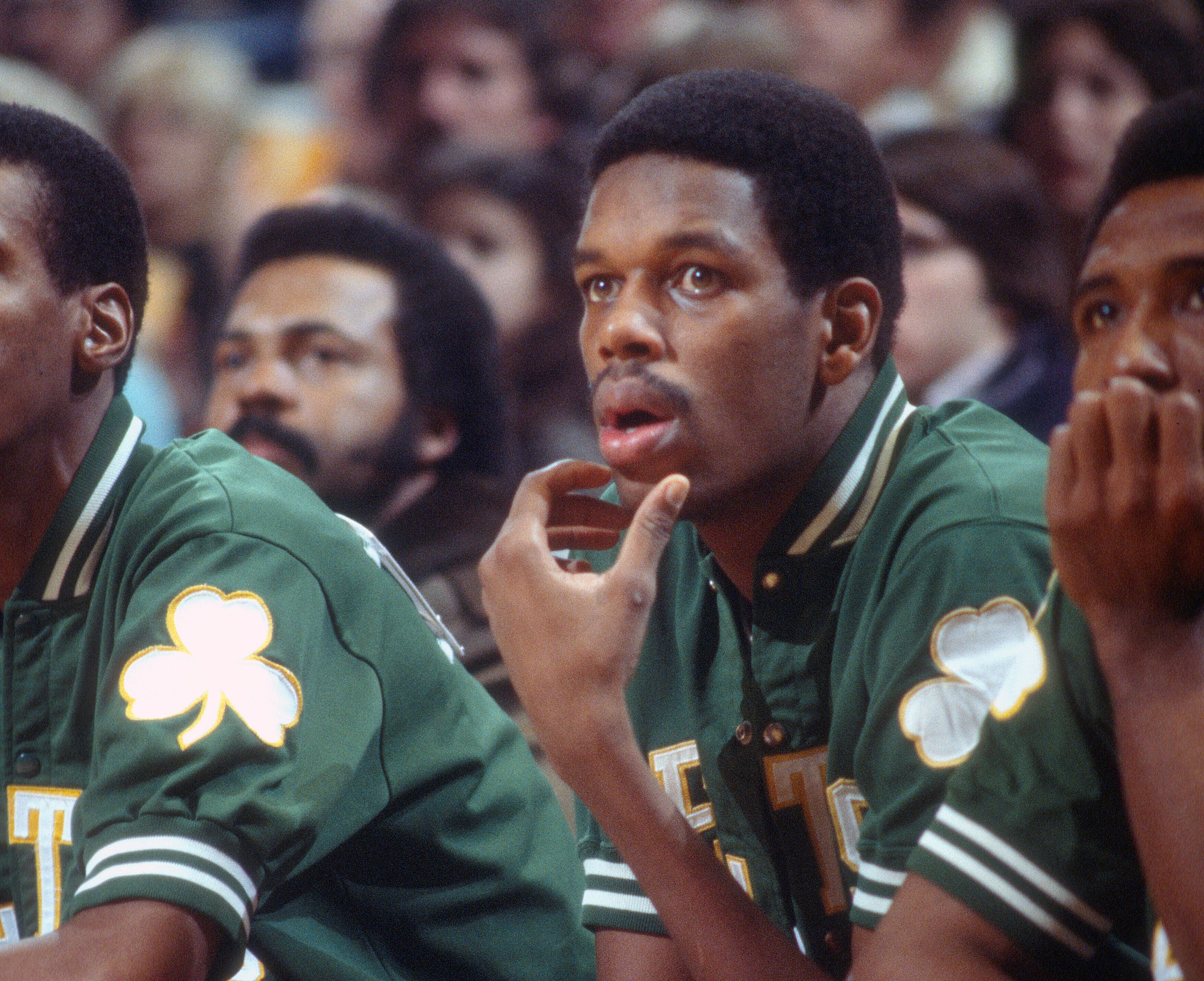 Cedric Maxwell of the Boston Celtics looks on from the bench.