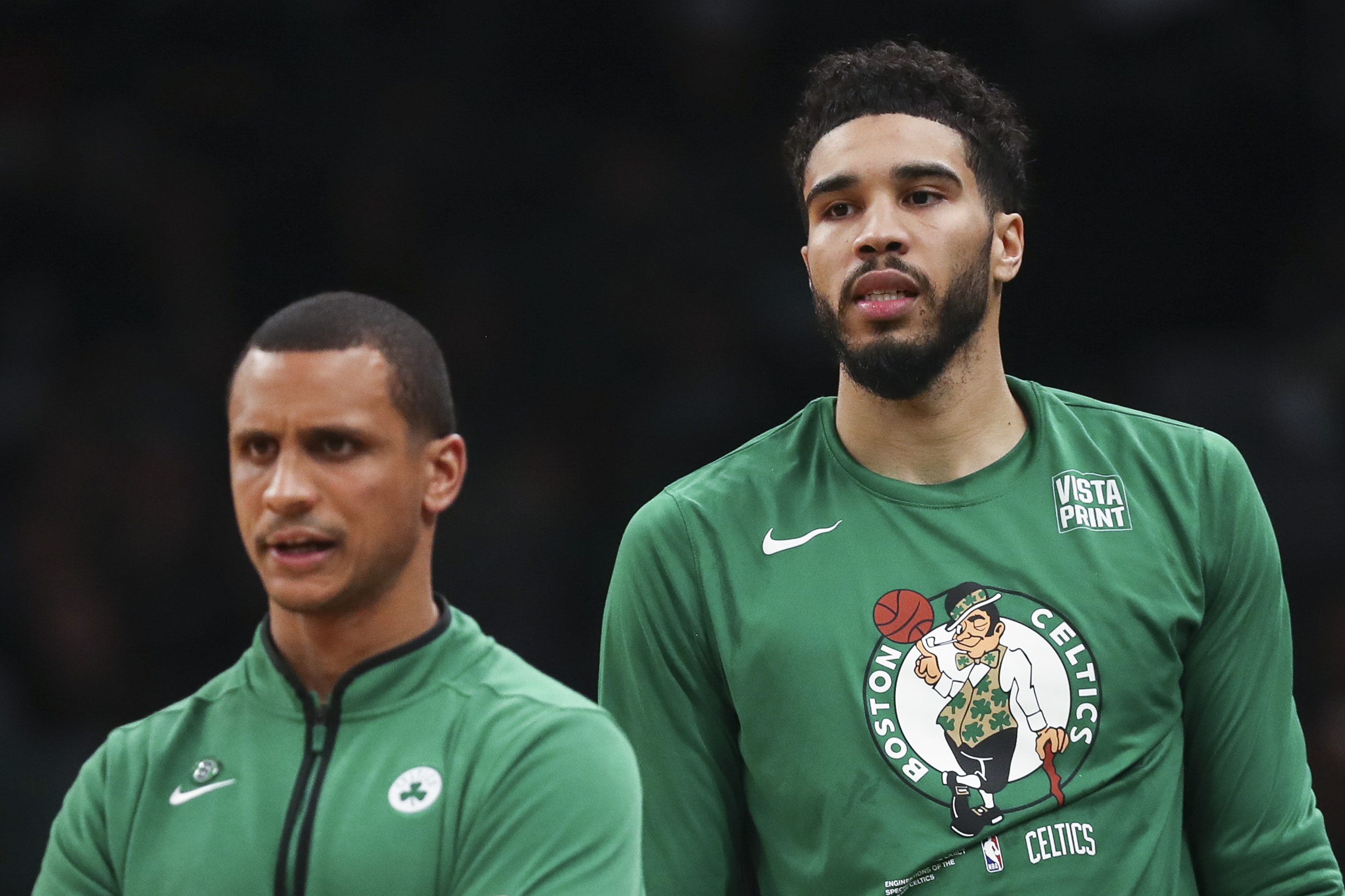 Head coach Joe Mazzulla and Jayson Tatum of the Boston Celtics look on.