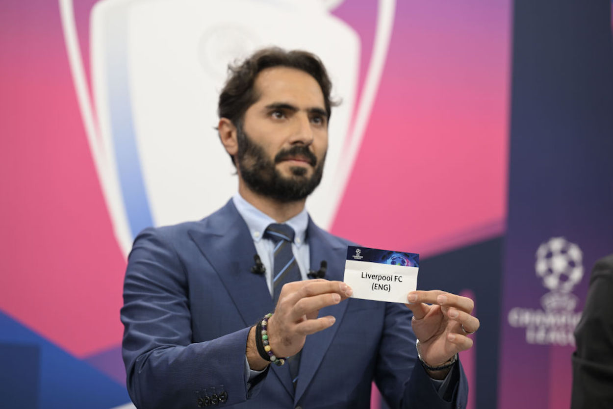 Hamit Altintop draws out the card of Liverpool FC during the UEFA Champions League 2022/23 Round of 16 draw.