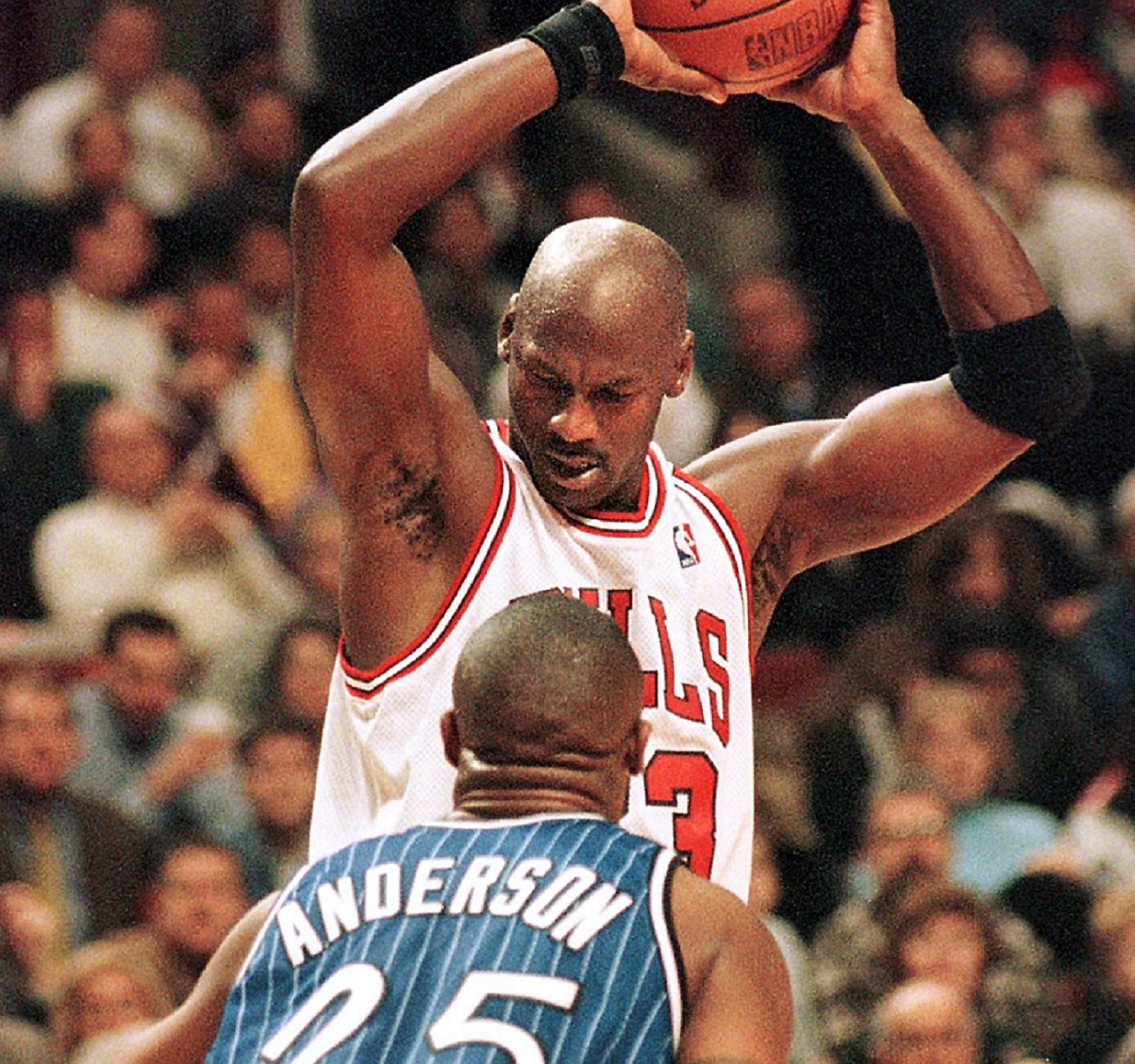 Michael Jordan against Nick Anderson during a Bulls-magic matchup on November 5, 1997