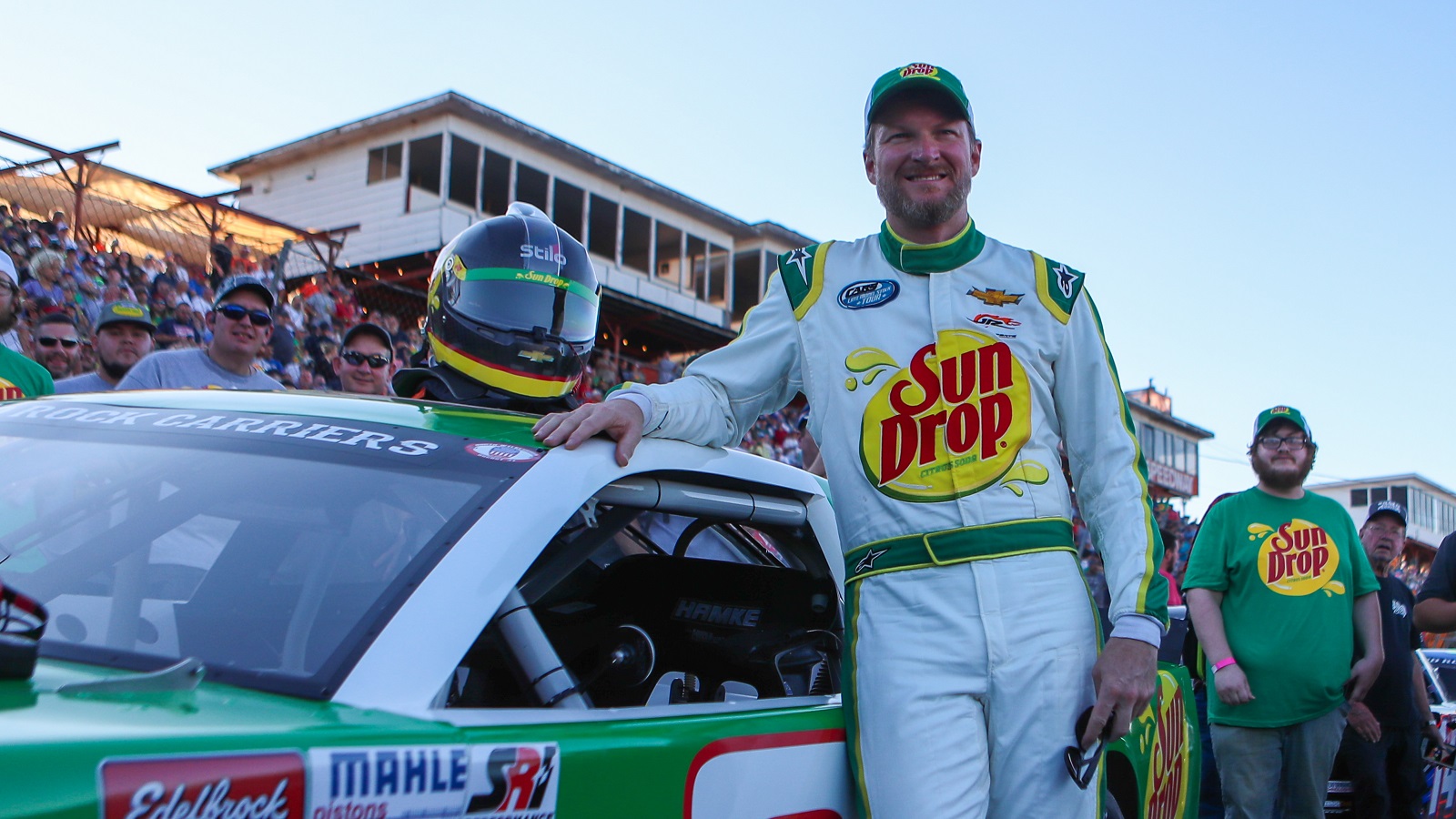 Dale Earnhardt Jr. stands next to his car on the starting grid moments before the Cars Tour LMSC 125 on Aug 31, 2022, at the North Wilkesboro Speedway.
