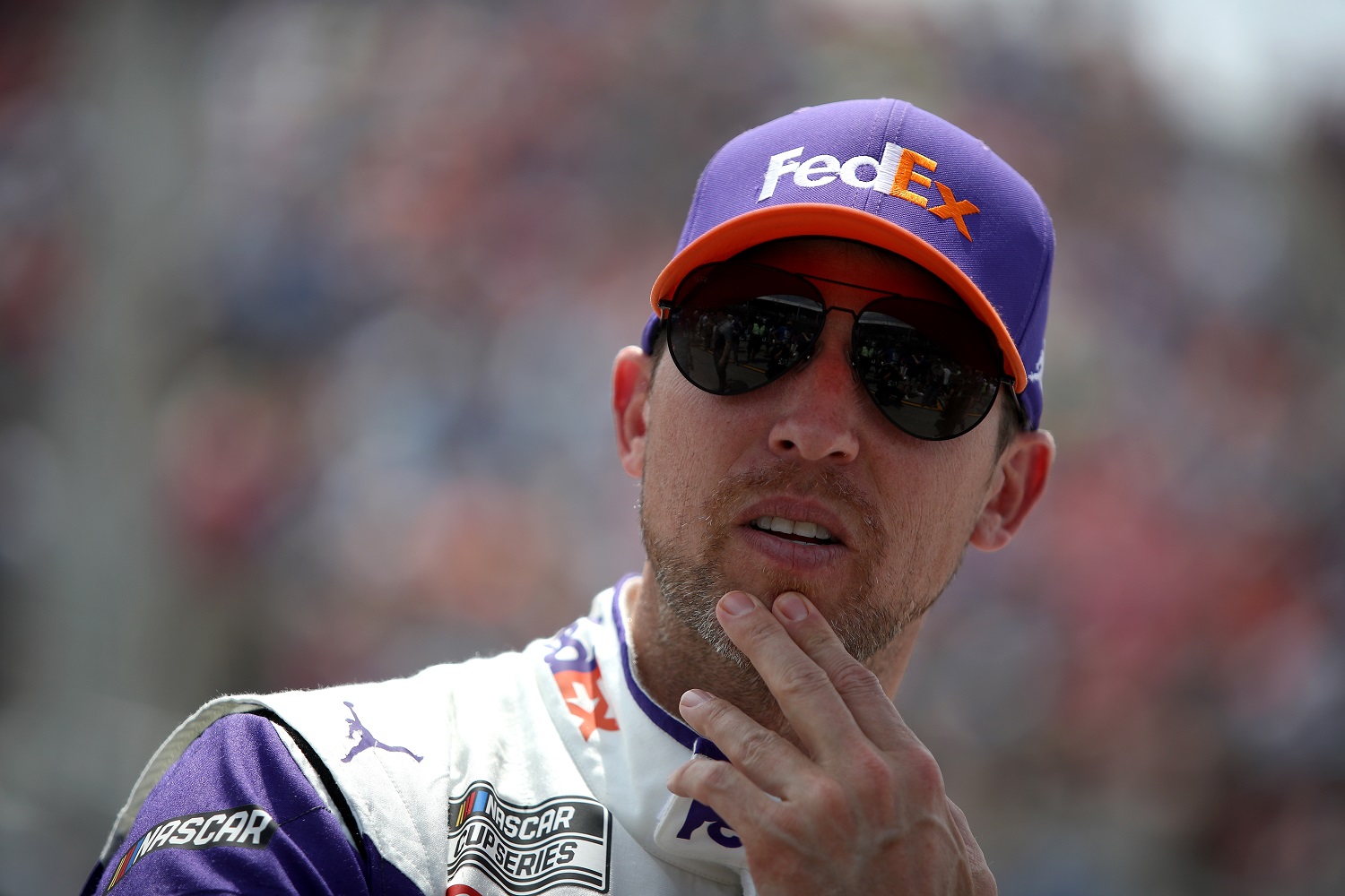 Denny Hamlin looks on during the NASCAR Cup Series Enjoy Illinois 300 at WWT Raceway on June 5, 2022 in Madison, Illinois.
