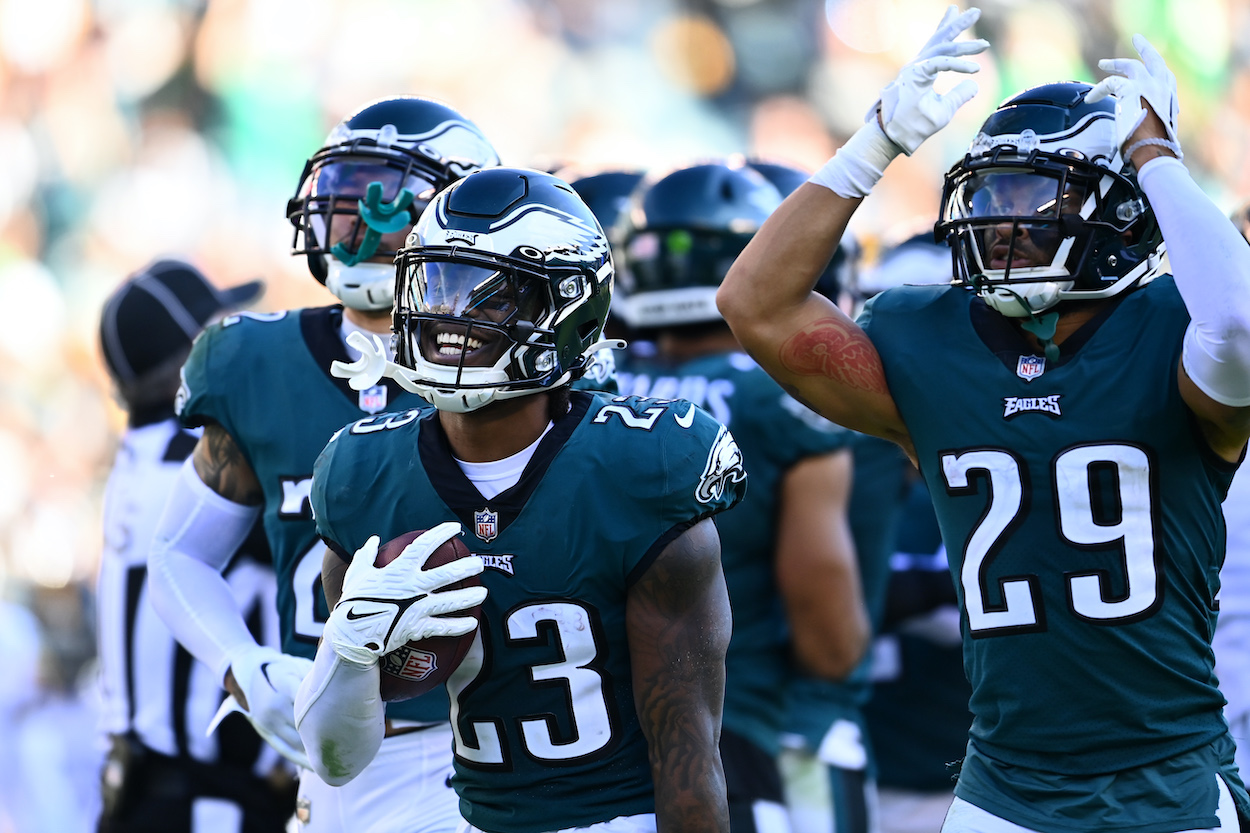 The Eagles celebrate after an interception.