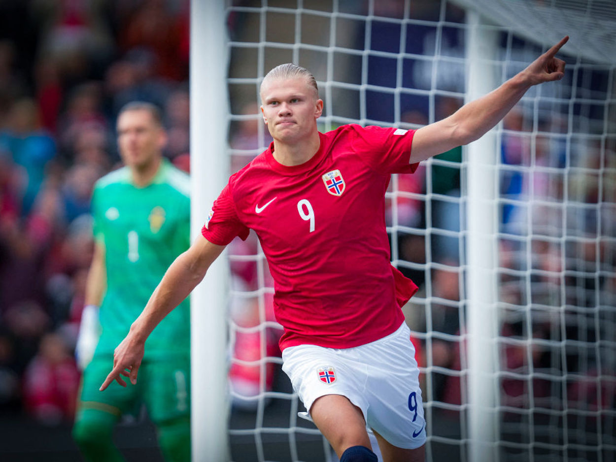 Erling Haaland celebrates scoring a goal for Norway.