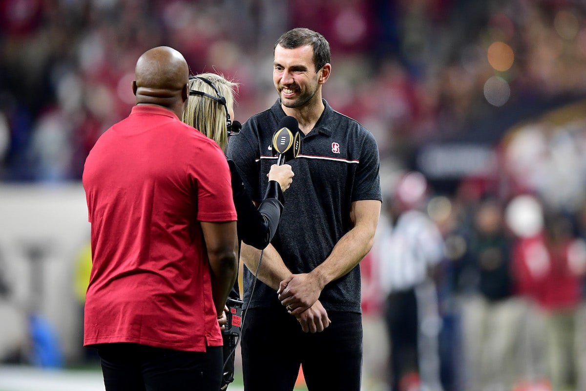 Prior Indianapolis Colts player Andrew Luck is interviewed during the 2022 CFP National Championship Game