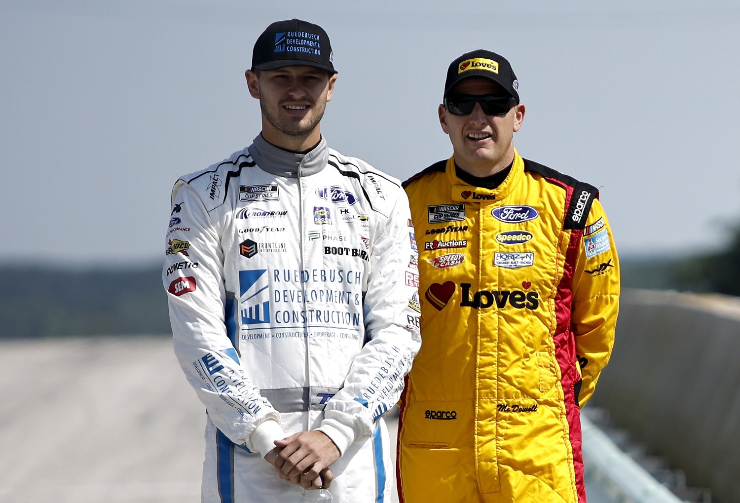 Todd Gilliland and Michael McDowell wait on the grid during practice for the NASCAR Cup Series Kwik Trip 250 at Road America on July 2, 2022 in Elkhart Lake, Wisconsin.