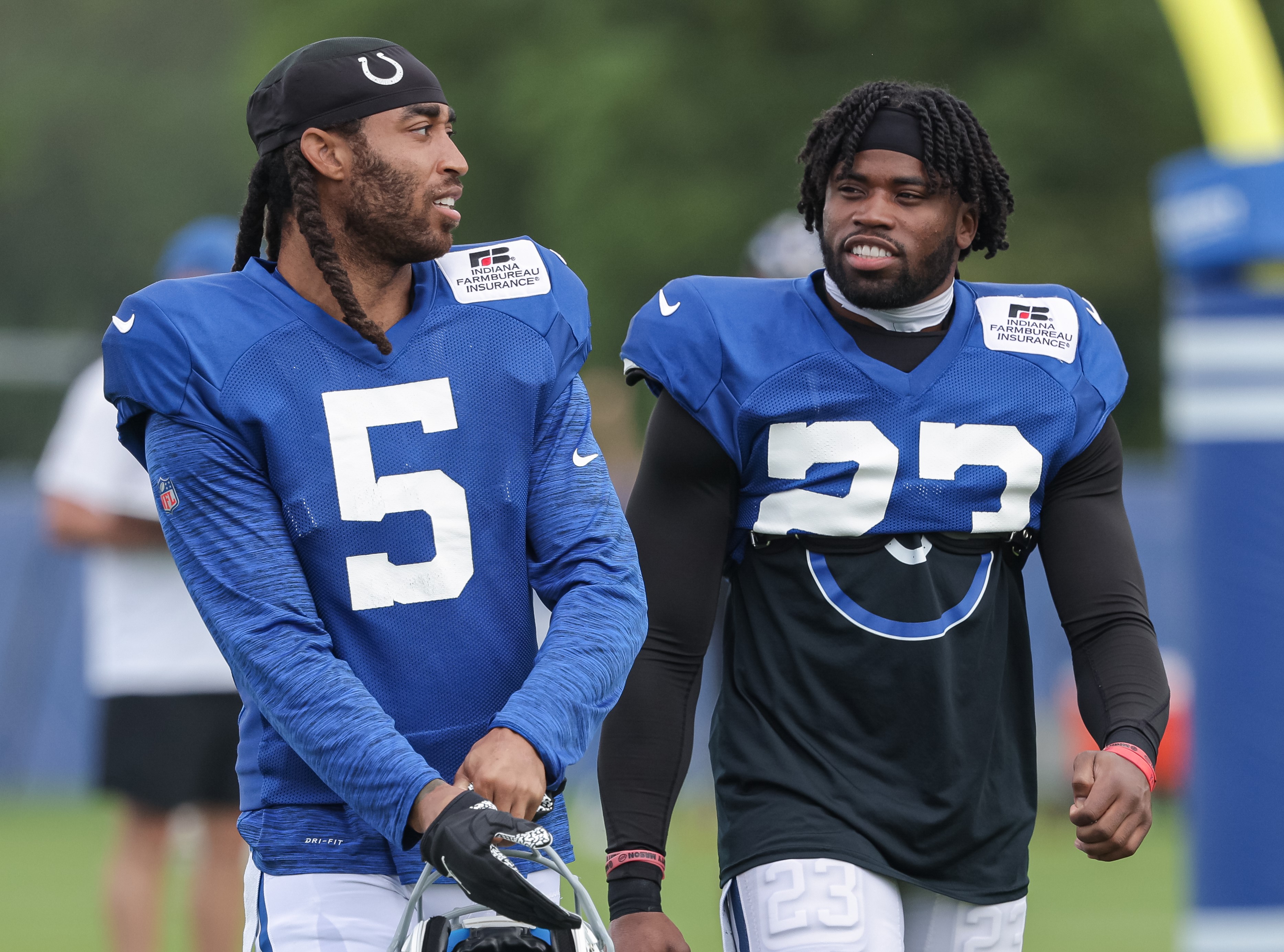 Stephon Gilmore, left, and Kenny Moore II of the Indianapolis Colts are seen during training camp.