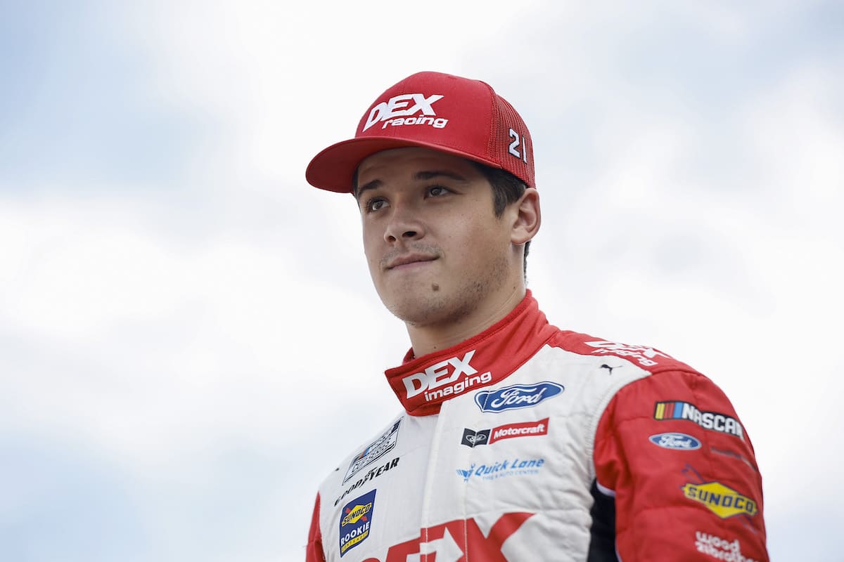 Harrison Burton, driver of the #21 Dex Imaging Ford, walks onstage before the NASCAR Cup Series South Point 400 at Las Vegas Motor Speedway