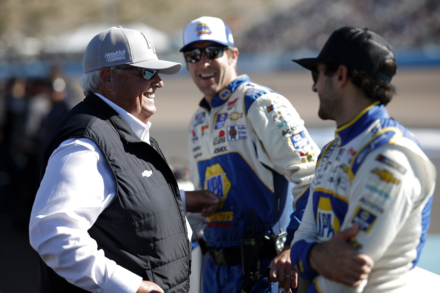 NASCAR Hall of Famer and HMS team owner Rick Hendrick spends time with crew chief Alan Gustafson and Chase Elliott on the grid prior to the NASCAR Cup Series Championship at Phoenix Raceway on Nov. 6, 2022.