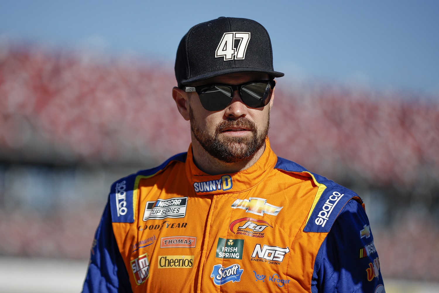 Ricky Stenhouse Jr., driver of the No. 47 Chevrolet, walks the grid during qualifying for the NASCAR Cup Series YellaWood 500 at Talladega Superspeedway on Oct. 1, 2022.