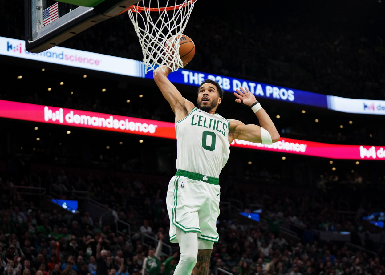 Jayson Tatum of the Boston Celtics dunks during the fourth quarter of the game against the Detroit Pistons.